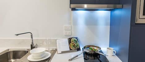 Microwave, stovetop, coffee/tea maker, electric kettle