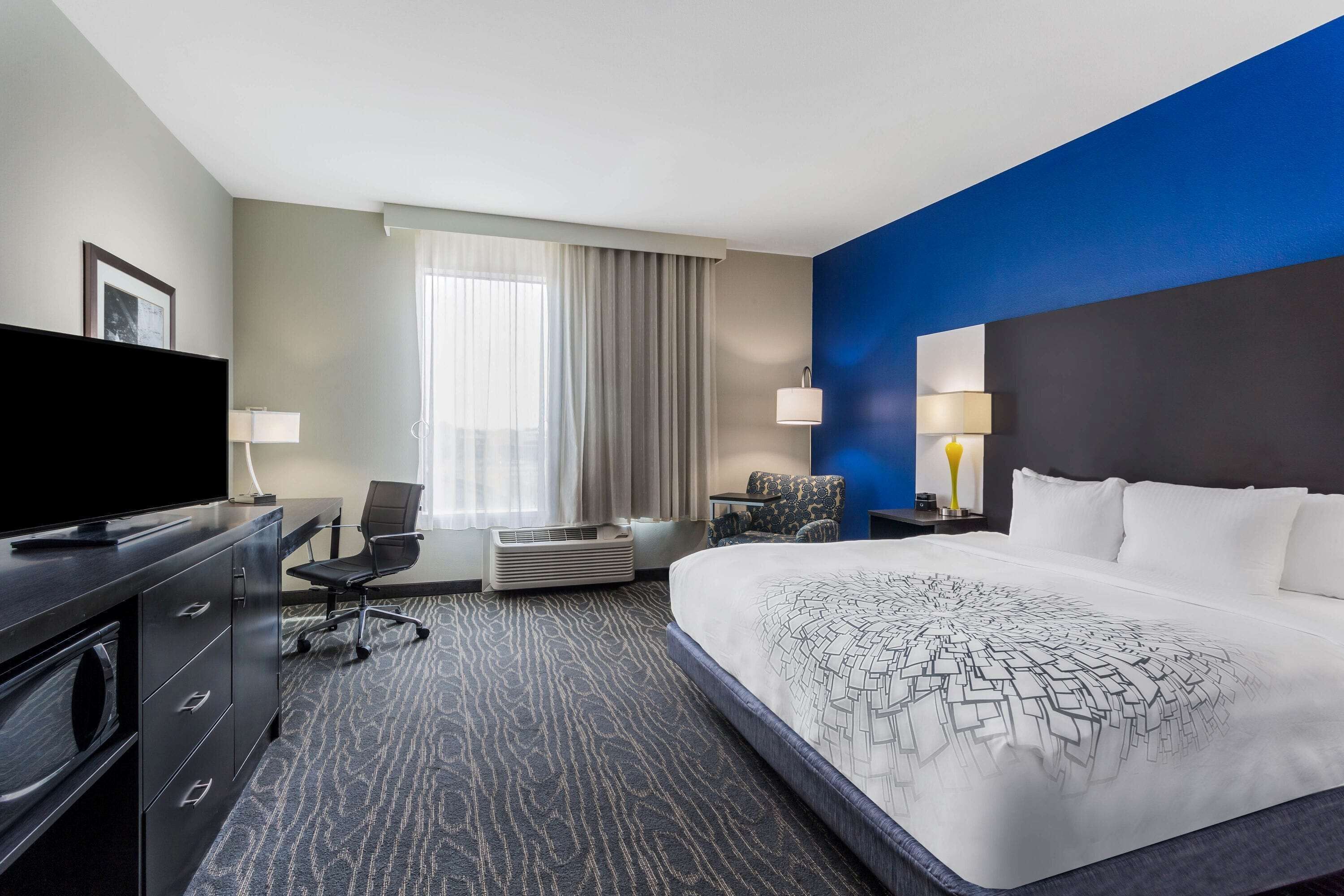 premium bedding, pillow-top beds, desk, iron/ironing board