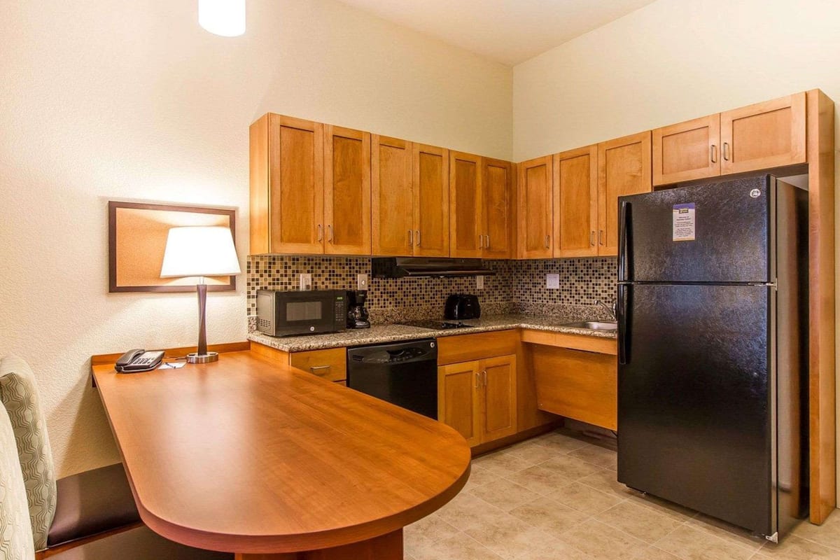 efficiency, 1 king bed with sofa bed, non smoking | premium bedding, desk, iron/ironing board, free wifi