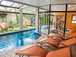 Indoor pool, outdoor pool, pool umbrellas, sun loungers