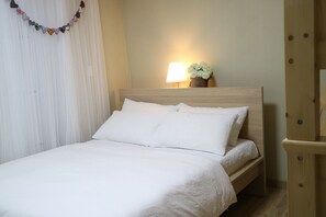 Premium bedding, down duvets, in-room safe, desk