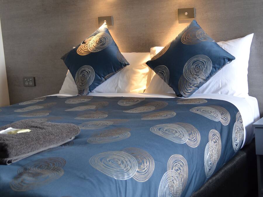 Blackout curtains, iron/ironing board, free WiFi, bed sheets