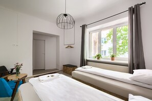 Classic Double or Twin Room, Non Smoking, Private Bathroom (Koralowy) | Premium bedding, in-room safe, iron/ironing board, rollaway beds - Lull Hostel (Warsaw)