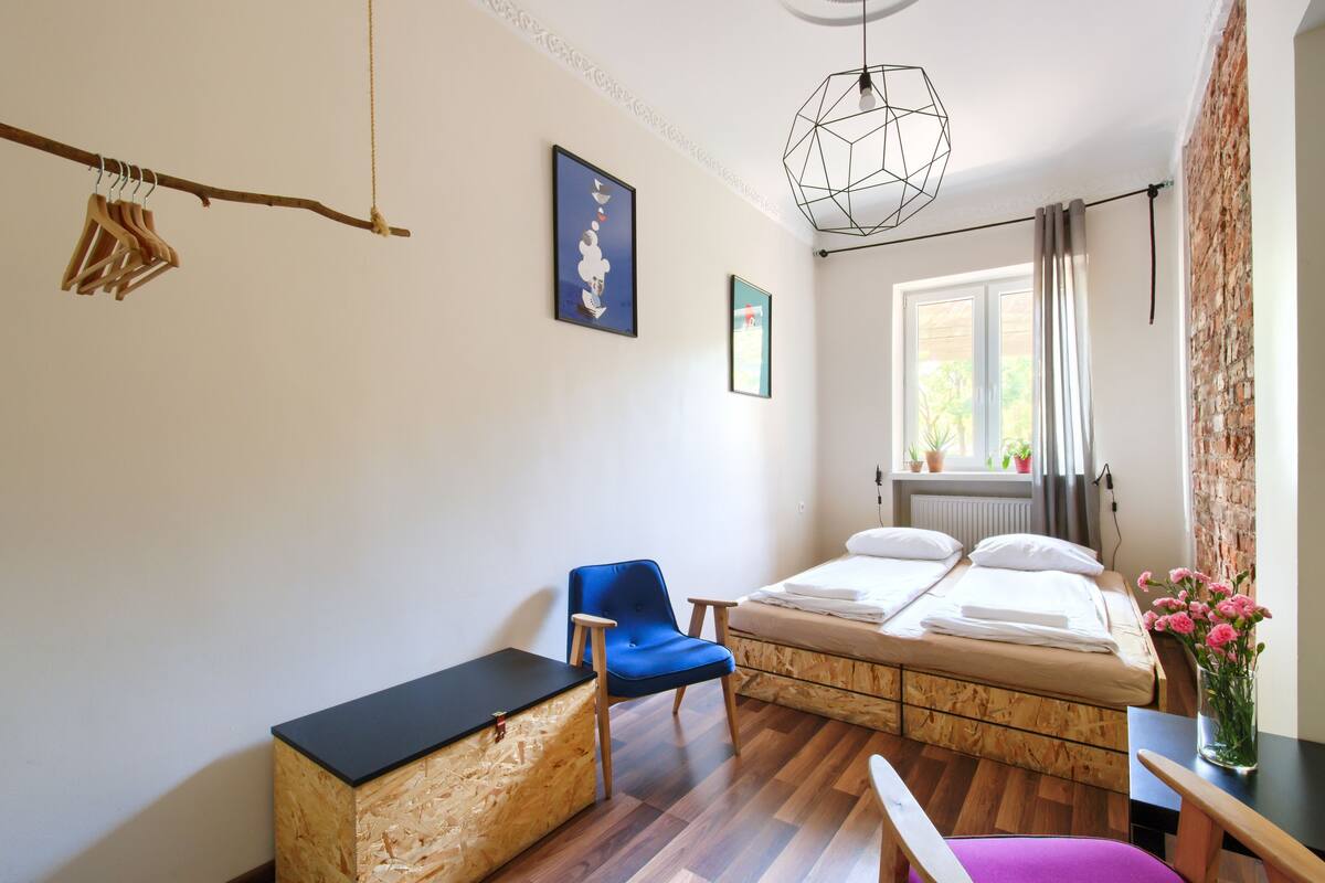 Economy Double Room, 1 Bedroom, Shared Bathroom, Ground Floor (Grafitowy) | Premium bedding, in-room safe, iron/ironing board