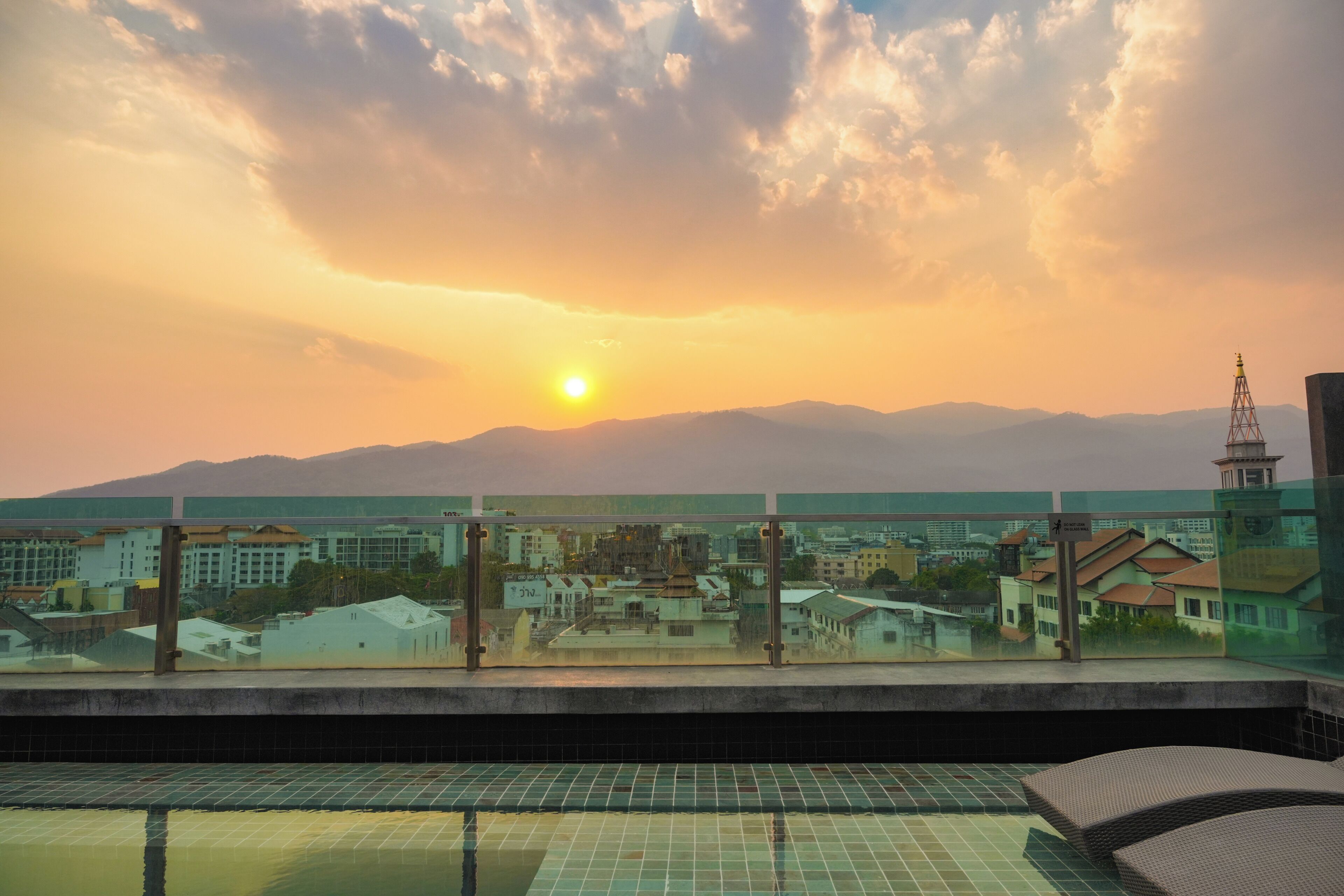 outdoor pool, open 7:00 am to 8:00 pm, pool umbrellas, pool loungers