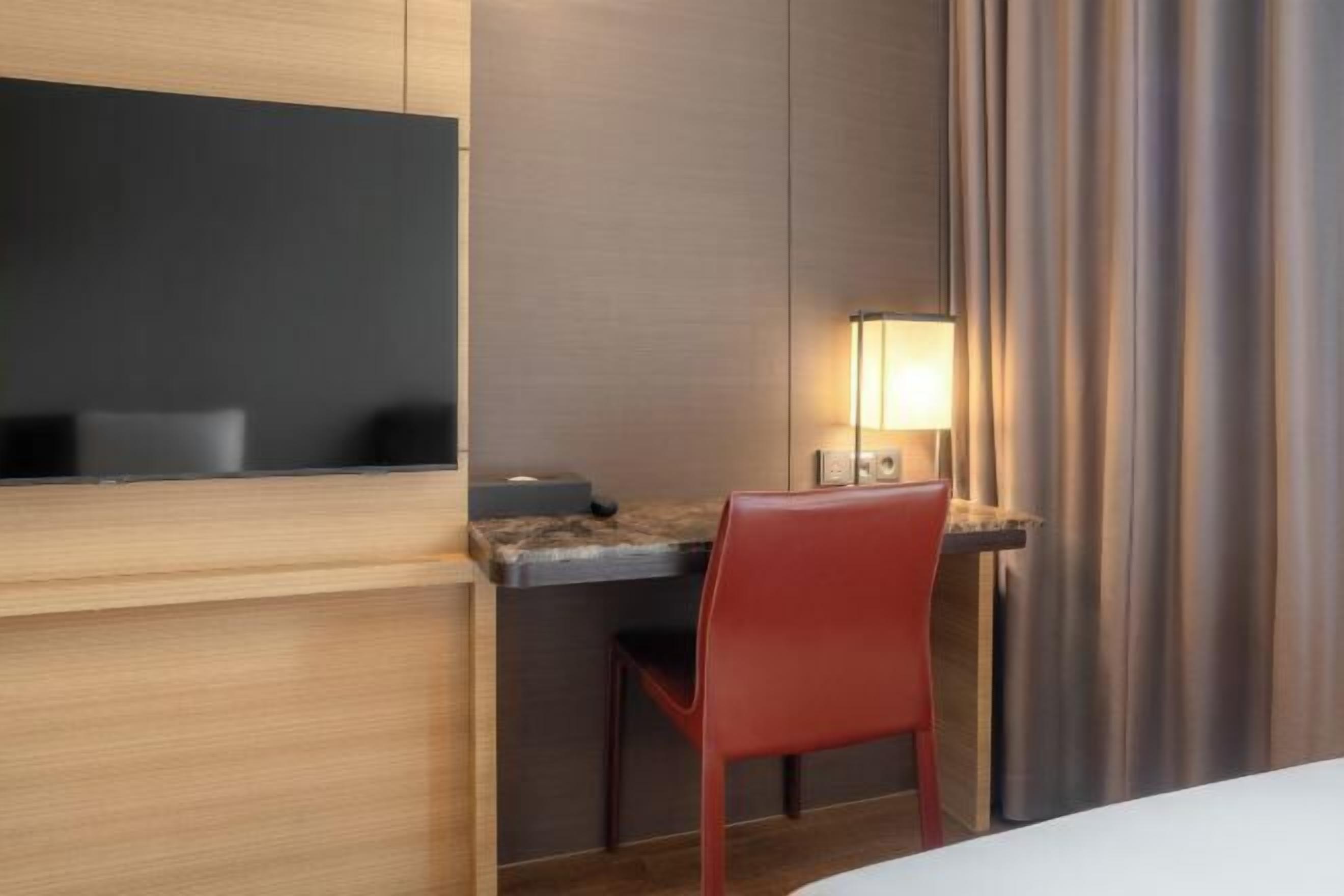 Premium bedding, down comforters, pillowtop beds, in-room safe