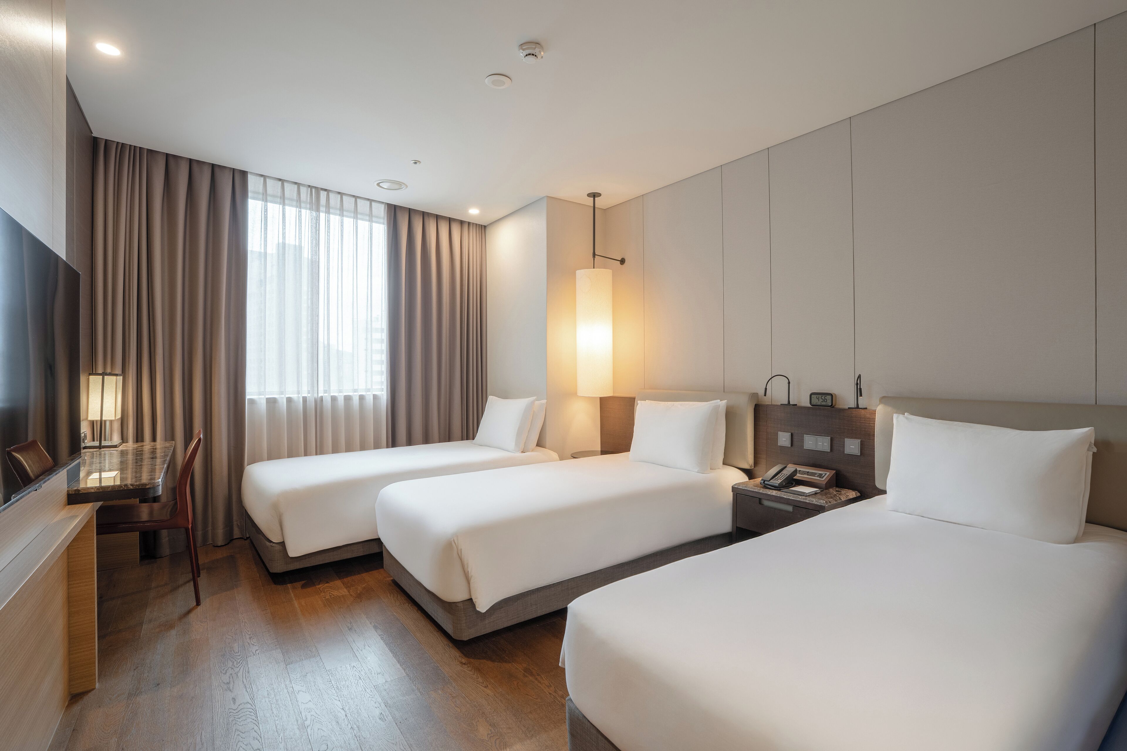 Deluxe Triple Room | Premium bedding, down comforters, pillowtop beds, in-room safe