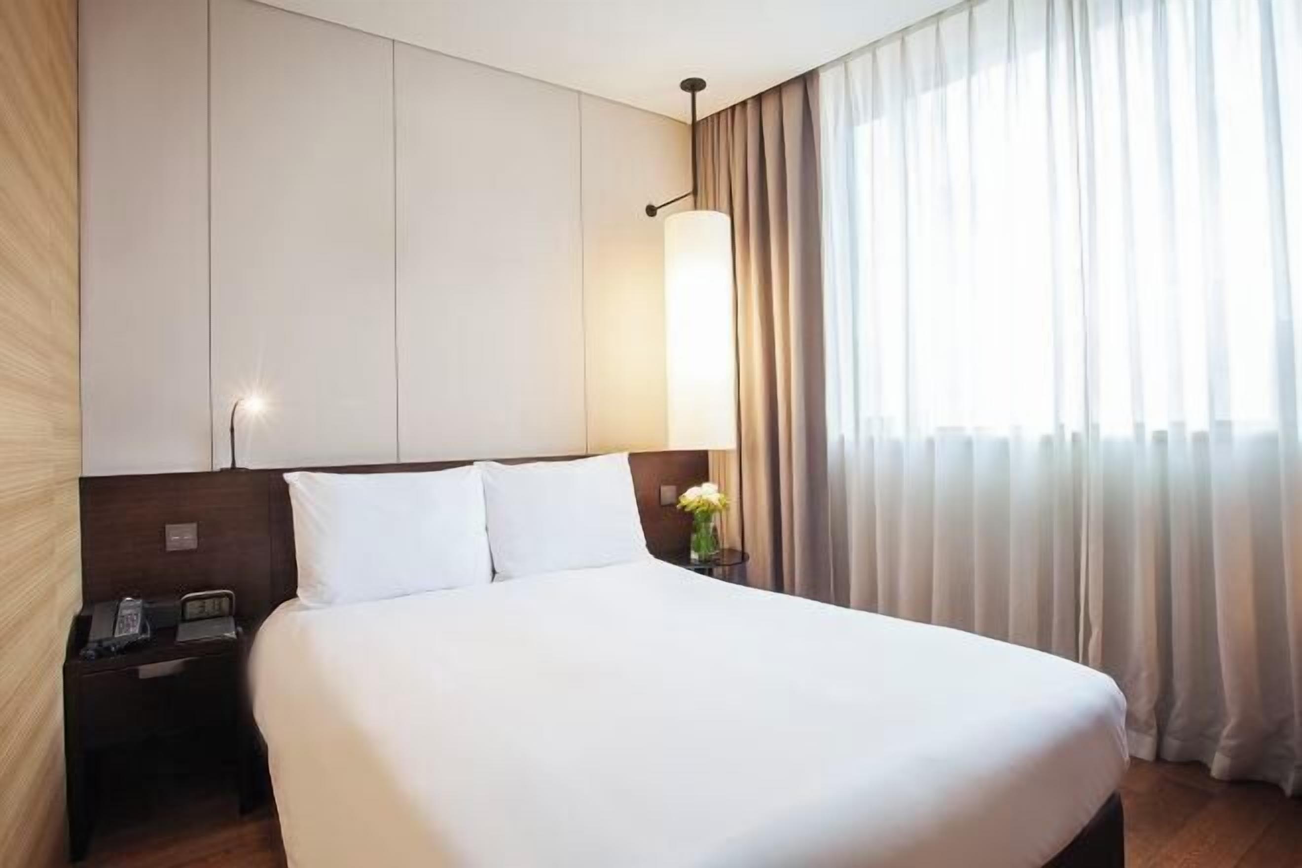 Premium bedding, down comforters, pillowtop beds, in-room safe