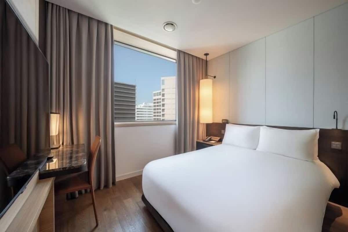Premium bedding, down comforters, pillowtop beds, in-room safe