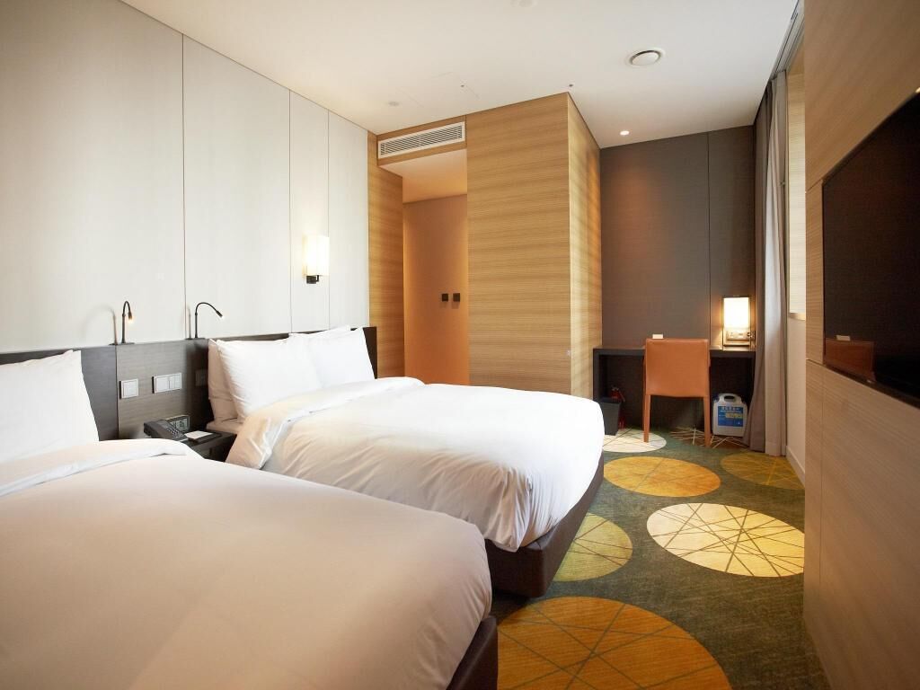 Premium bedding, down duvets, pillow-top beds, in-room safe