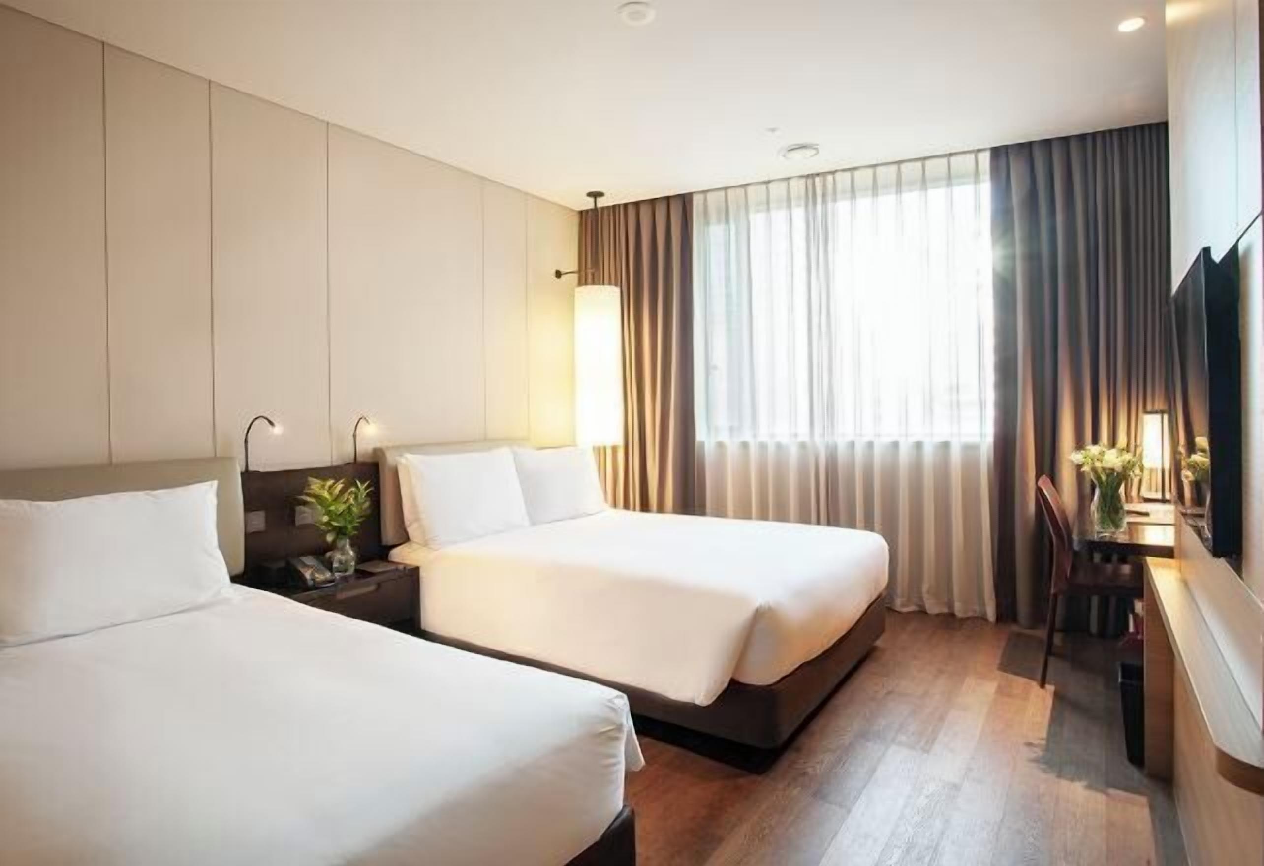 Premium bedding, down comforters, pillowtop beds, in-room safe