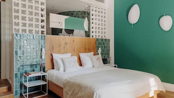 Luxe beddengoed, pillowtop-bedden, een kluis op de kamer