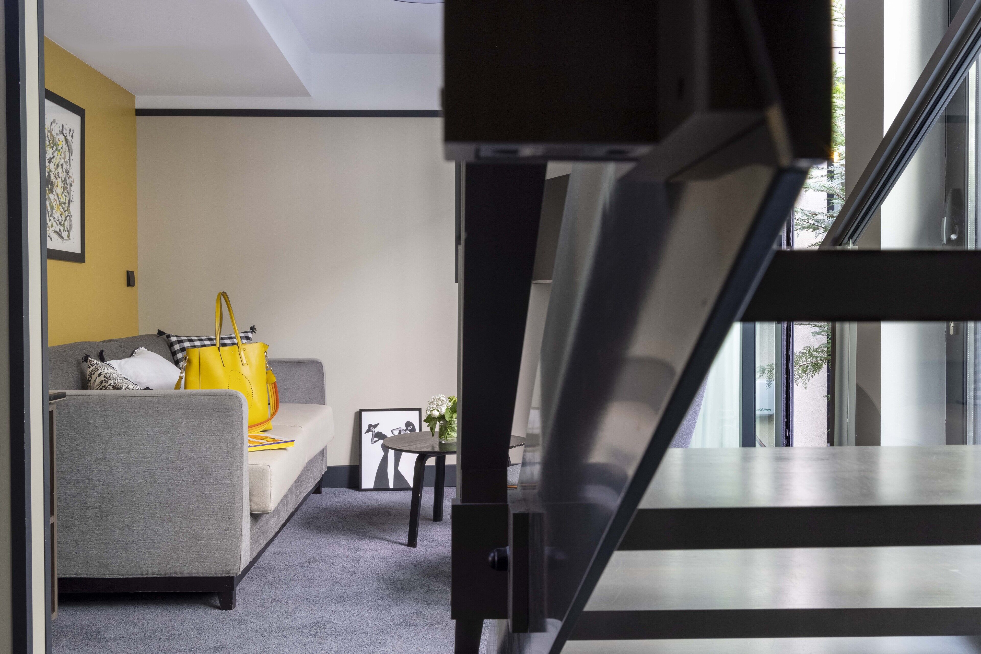 suite duplex | living area | 40-inch flat-screen tv with satellite channels, tv