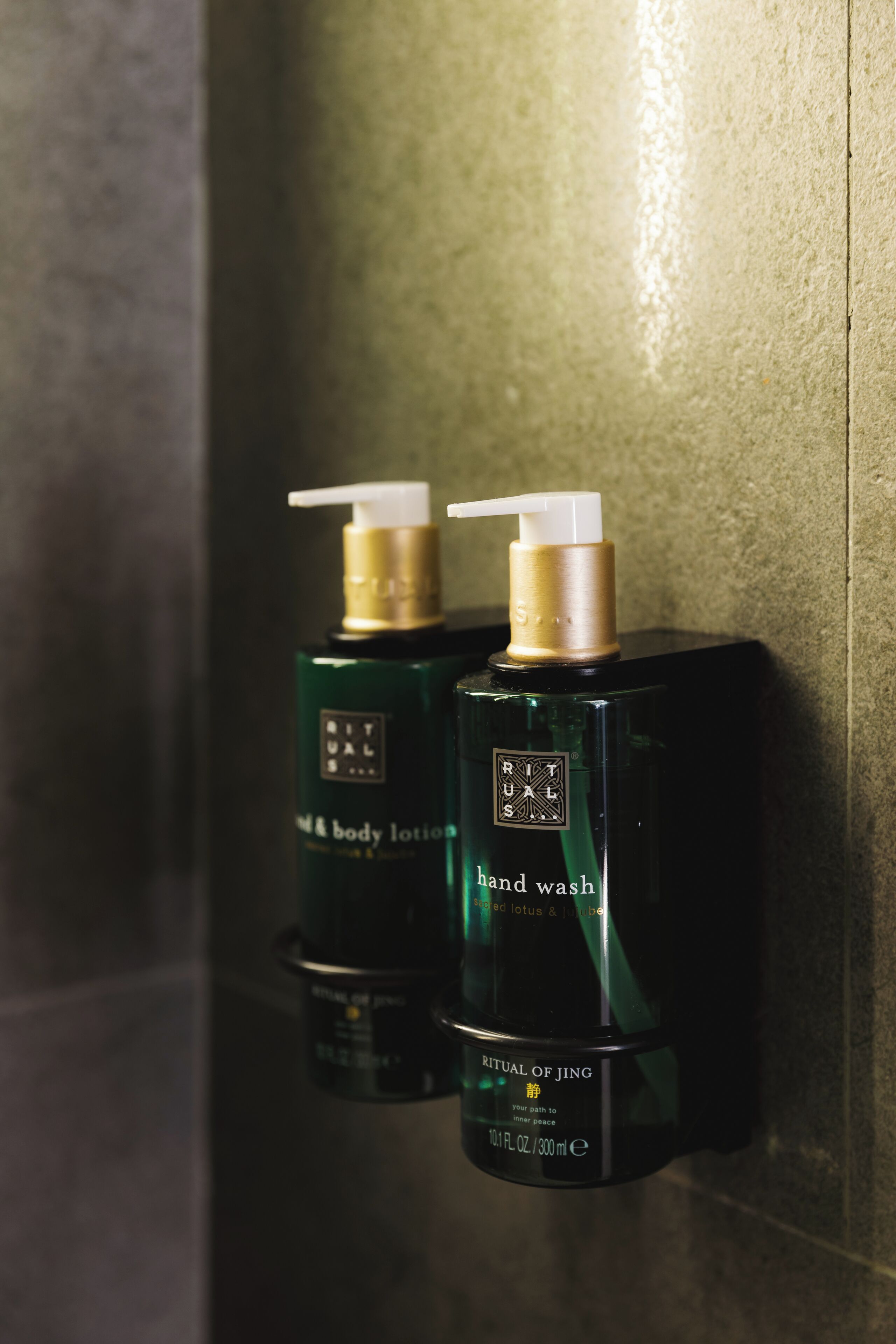 designer toiletries, hair dryer, bathrobes, slippers