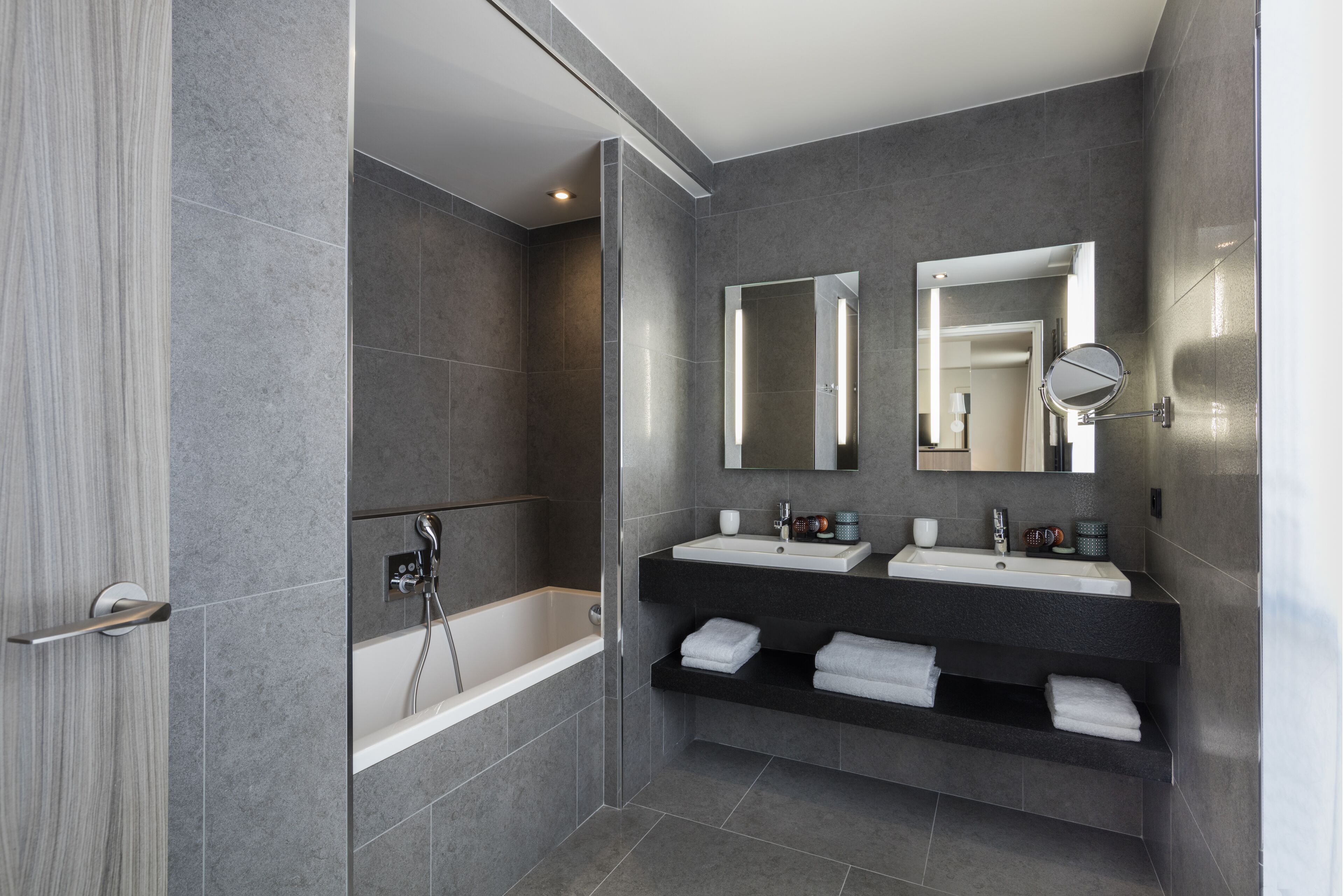 designer toiletries, hair dryer, bathrobes, slippers