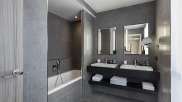 Designer toiletries, hair dryer, bathrobes, slippers