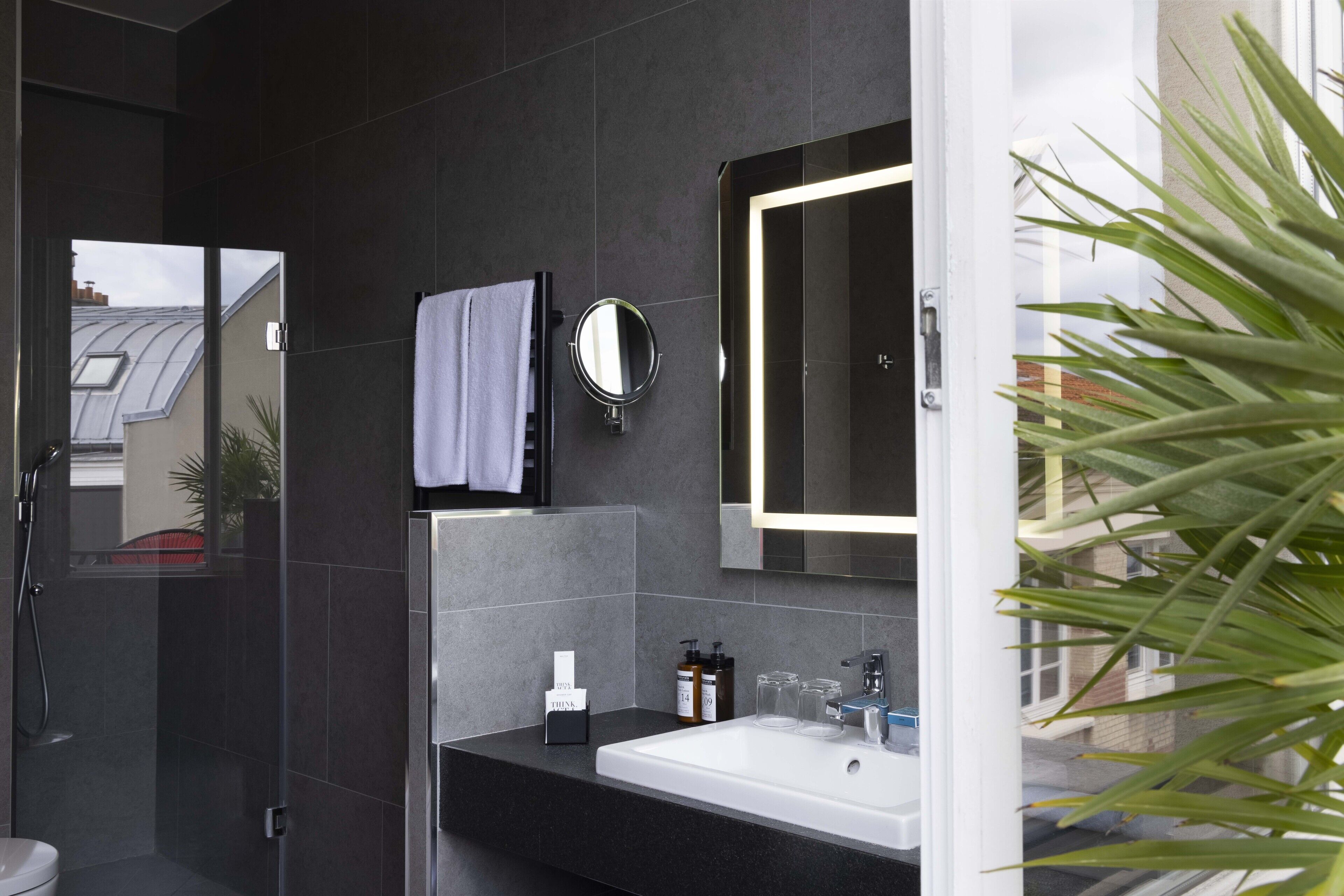 executive room | bathroom | designer toiletries, hair dryer, bathrobes, slippers