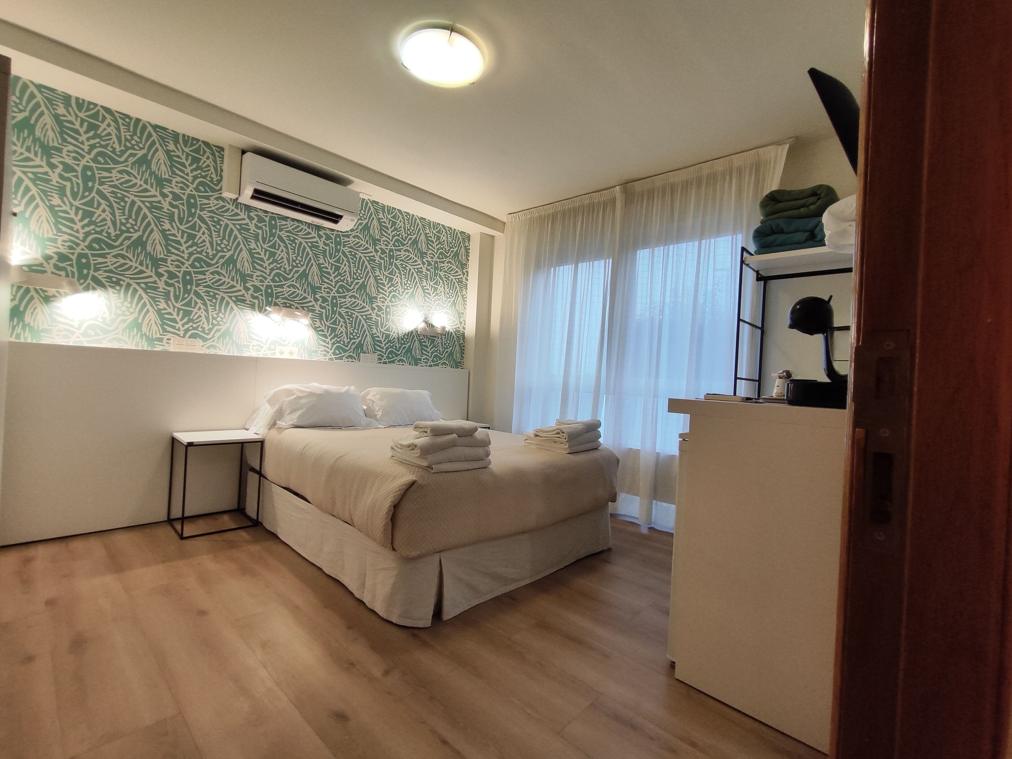 Desk, blackout curtains, free cots/infant beds, free WiFi