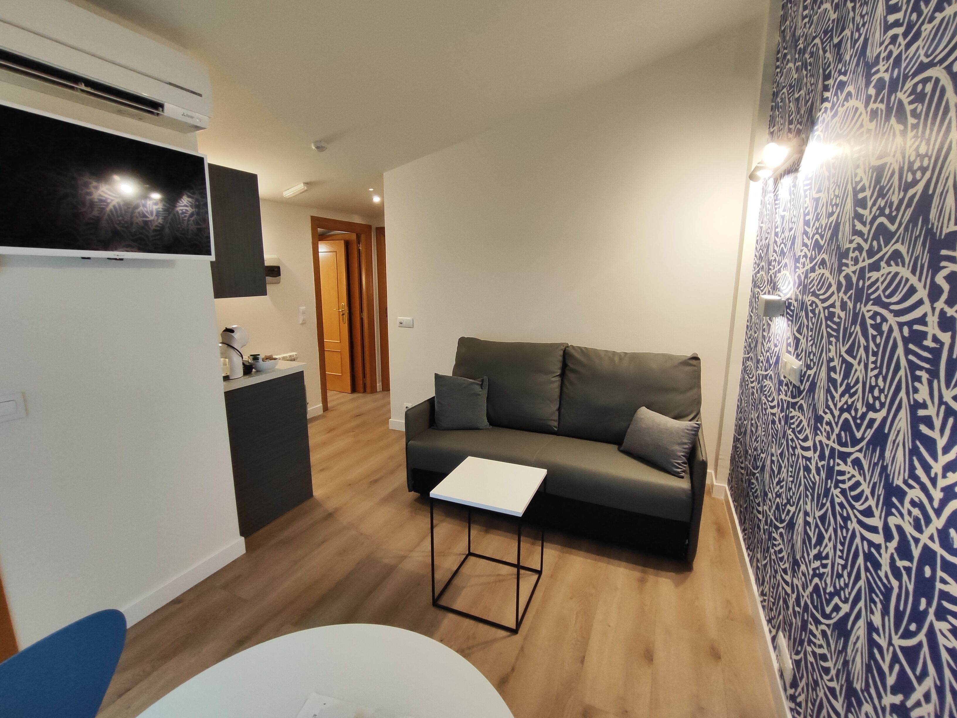Apartment, 1 Bedroom | Living area | Flat-screen TV