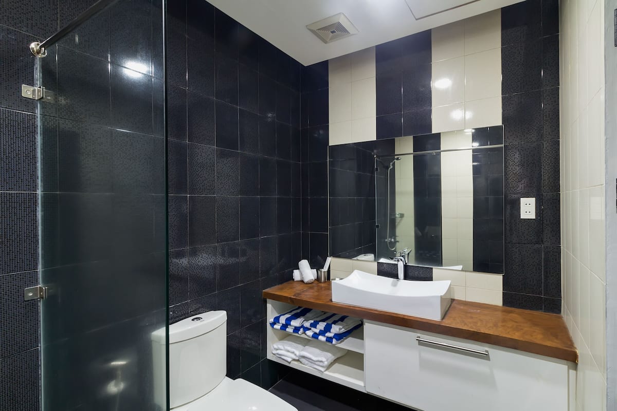 one bedroom suite | bathroom | free toiletries, hair dryer, slippers, bidet