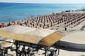 Private beach, white sand, sun-loungers, beach umbrellas
