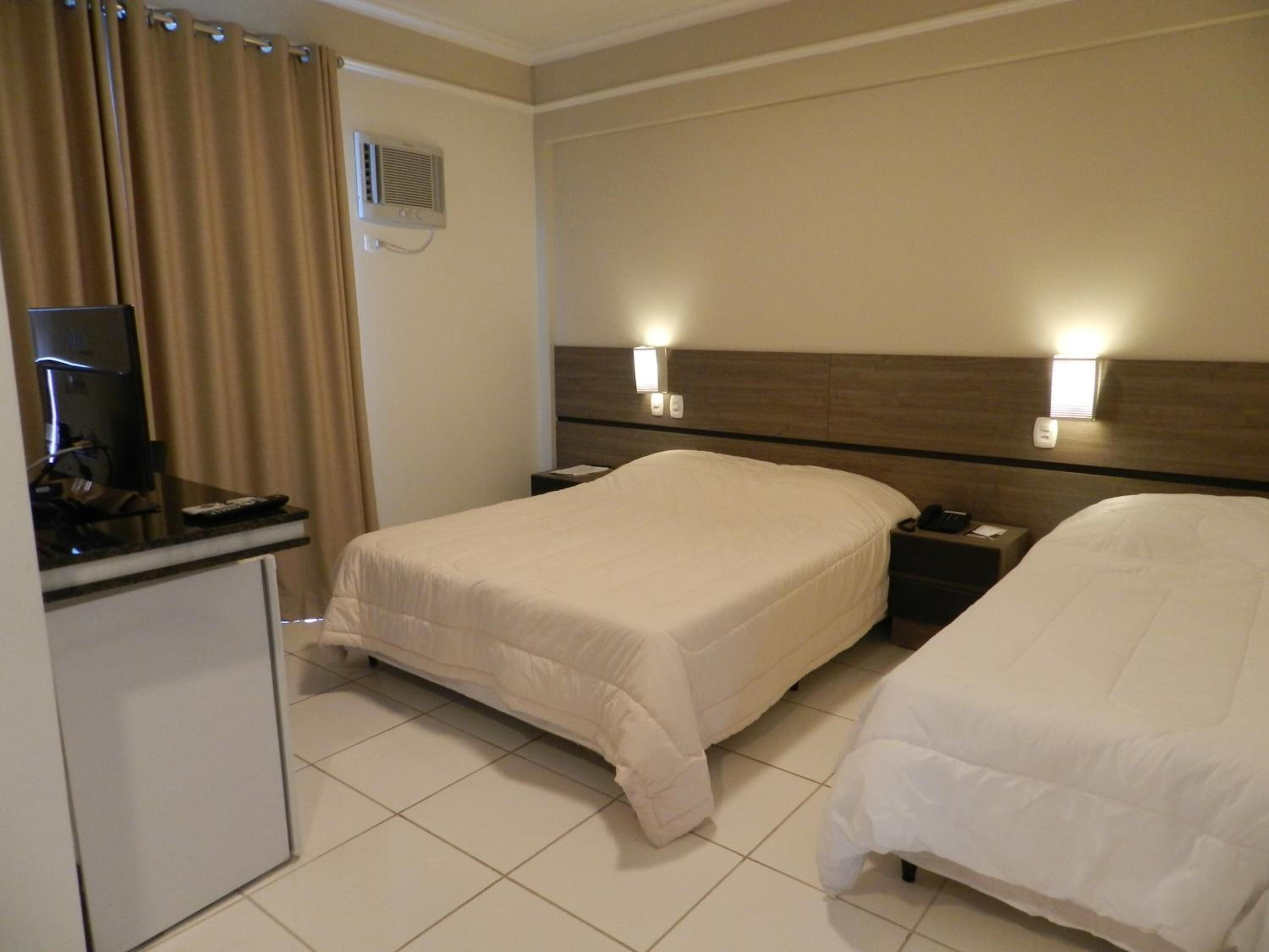 minibar, blackout curtains, iron/ironing board, free wifi