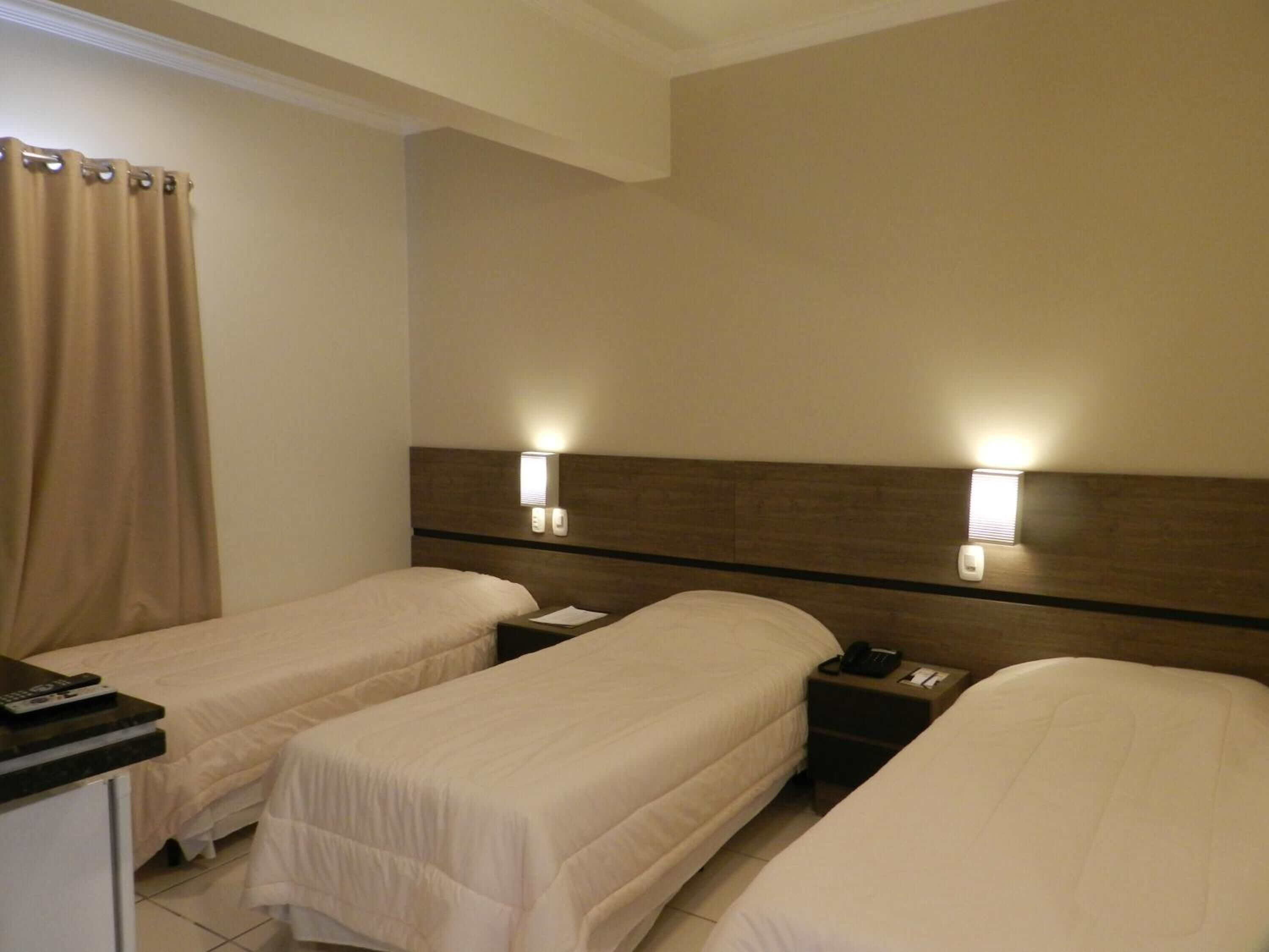 minibar, blackout curtains, iron/ironing board, free wifi