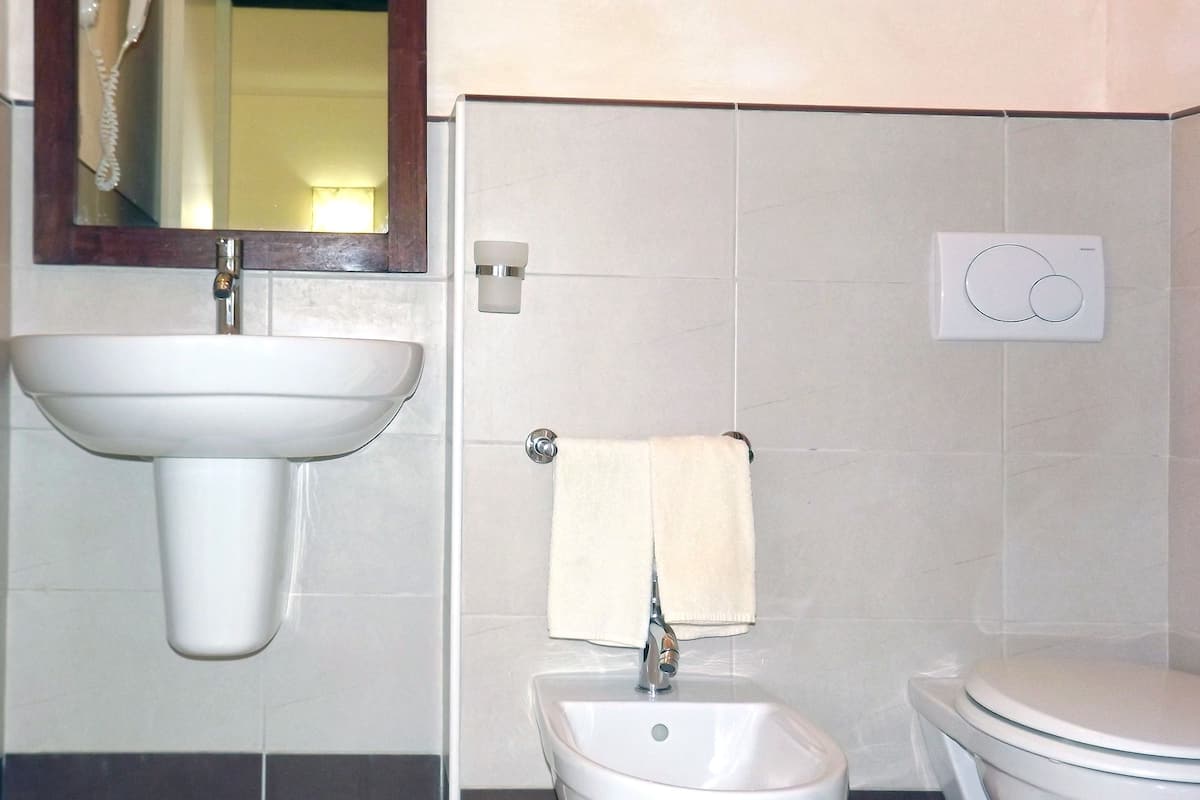 Standard Apartment, 2 Bedrooms, Balcony, Pool View | Bathroom | Shower, free toiletries, hair dryer, bidet