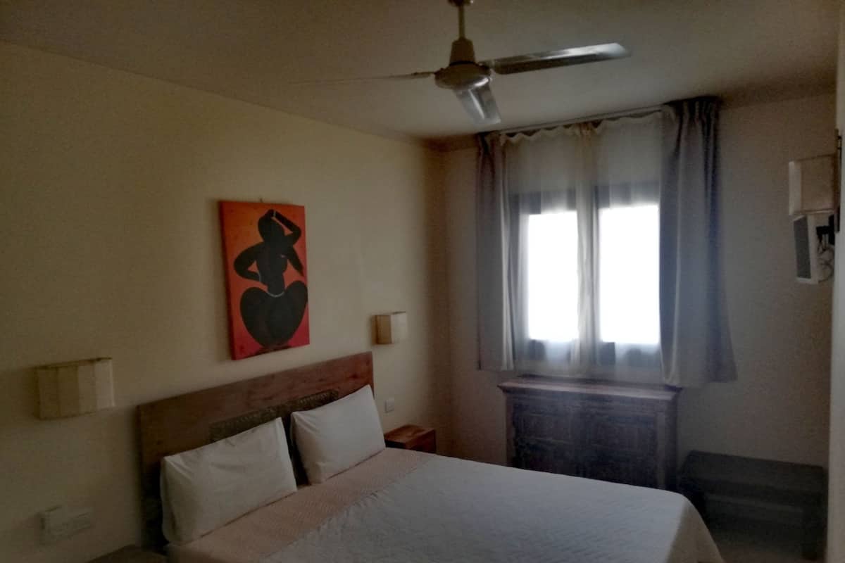 Standard Apartment, 1 Bedroom | Minibar, blackout drapes, bed sheets