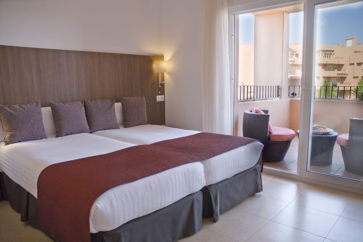 In-room safe, desk, iron/ironing board, WiFi (free)
