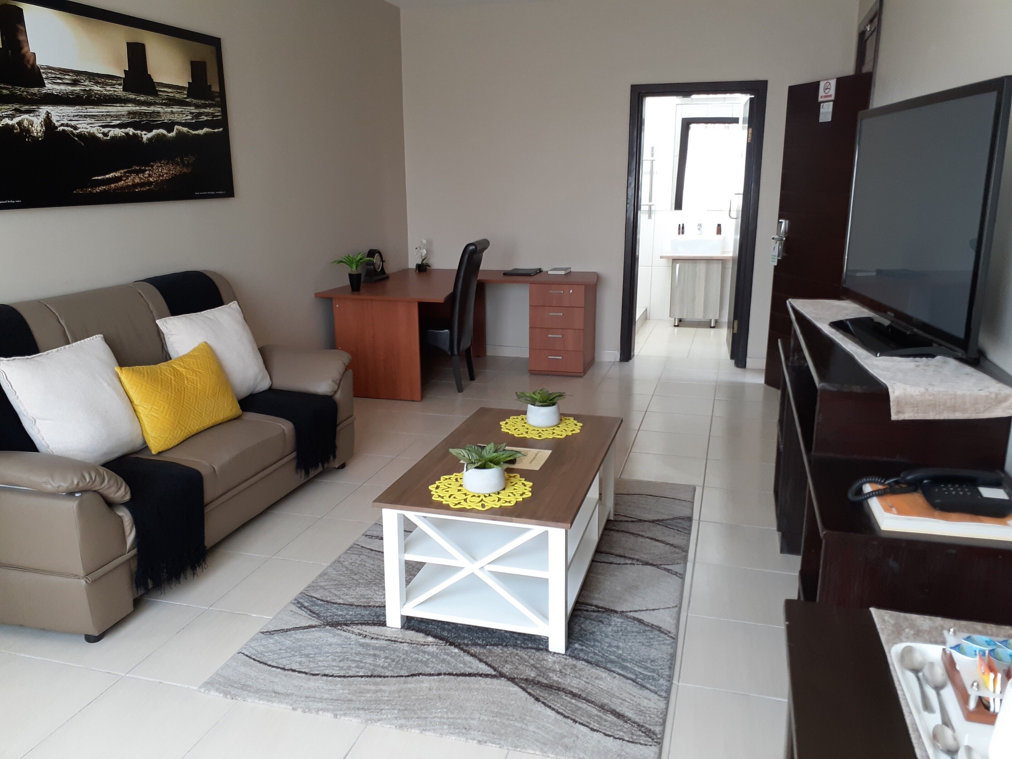 family room | living area | flat-screen tv