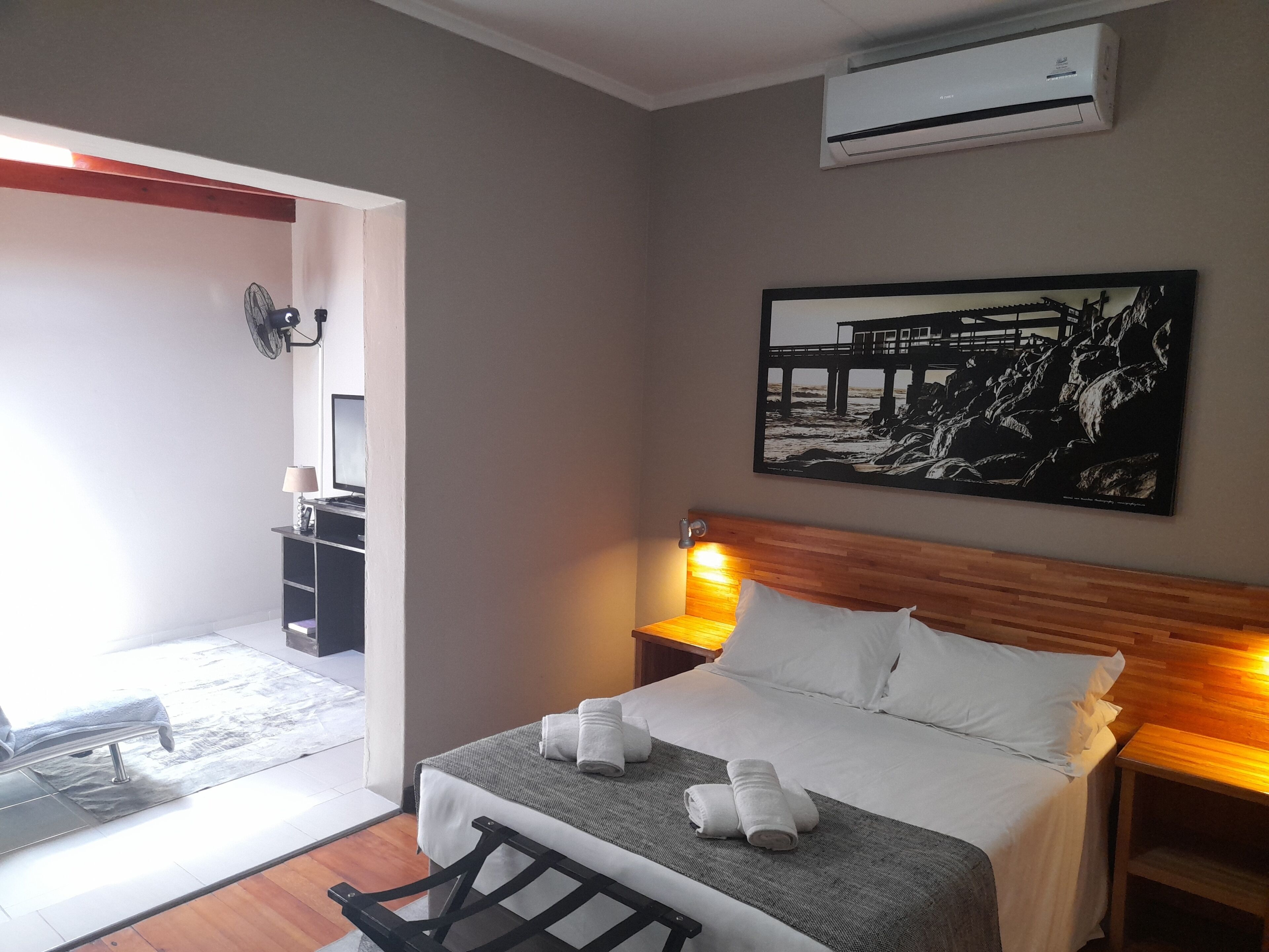 standard double or twin room | living area | flat-screen tv