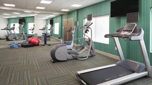 A gym with treadmills, elliptical machines, and exercise balls. - Holiday Inn Express Atlanta SW - Newnan by IHG (Newnan)