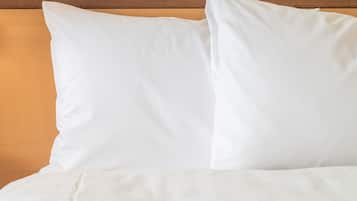 Ropa de cama de alta calidad y camas con pillow-top 