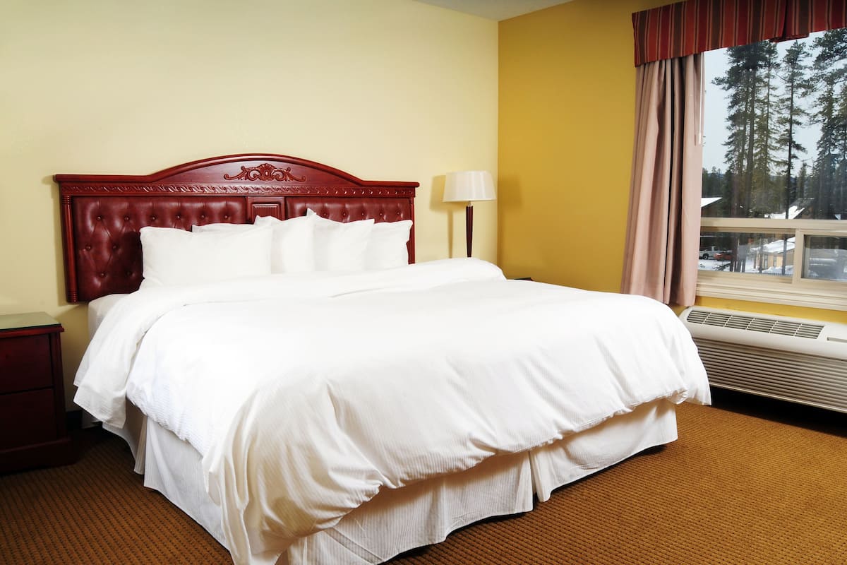 desk, laptop workspace, blackout curtains, iron/ironing board