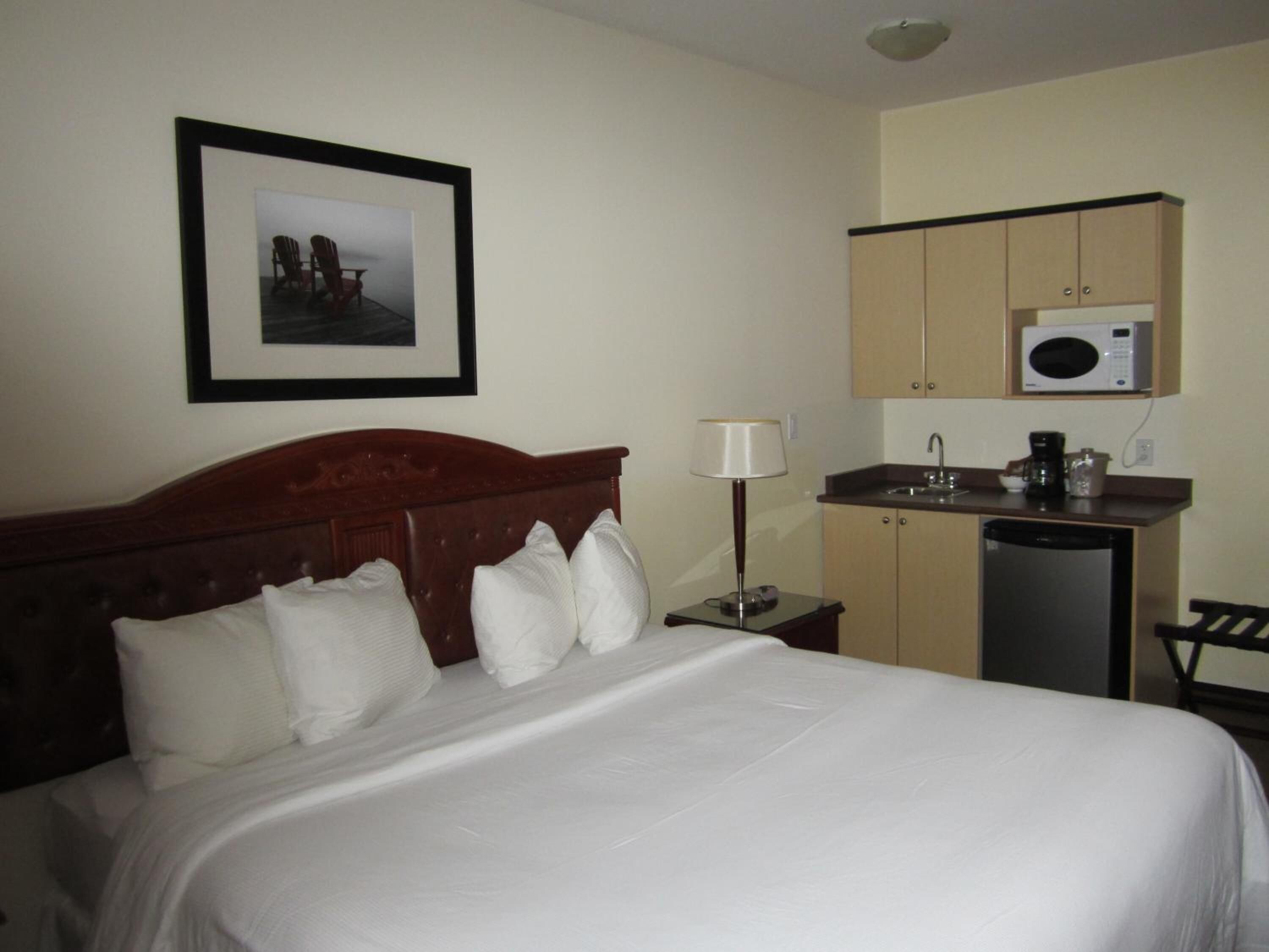 desk, laptop workspace, blackout curtains, iron/ironing board