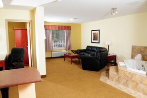 Deluxe Room, 1 King Bed, Jetted Tub | Living area | TV, DVD player - Trend Mountain Hotel & Conference Centre (Tumbler Ridge)