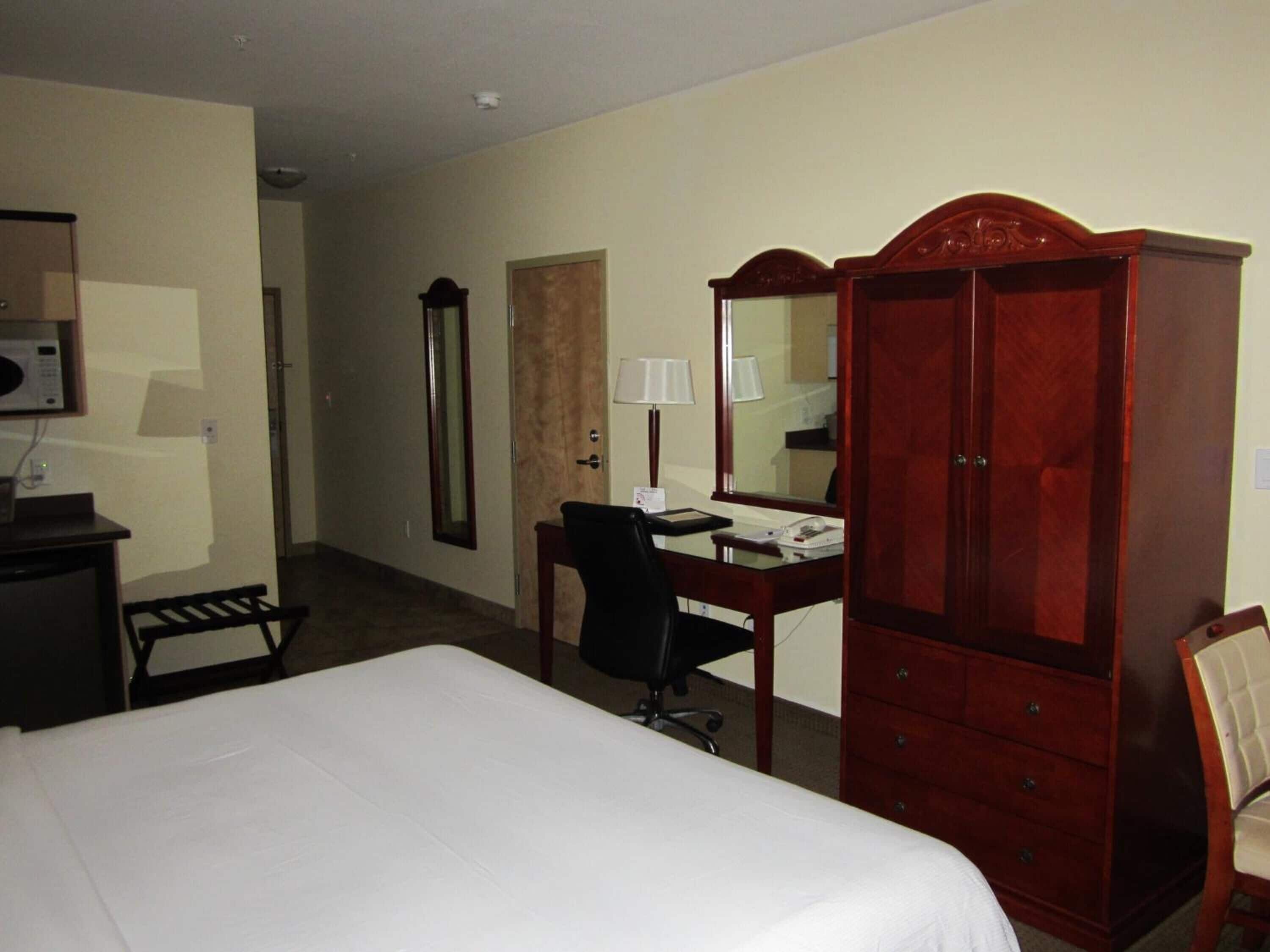 desk, laptop workspace, blackout curtains, iron/ironing board