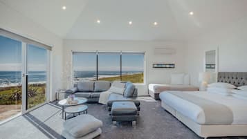 Luxury Waterfront Villa, Jacuzzi & Sauna | Living area | 50-inch flat-screen TV with digital channels, TV, DVD player