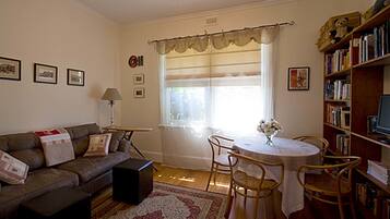 House, 1 Bedroom | Living area | Flat-screen TV, DVD player, iPod dock