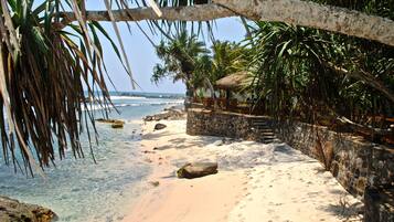 On the beach, white sand, beach shuttle, beach towels