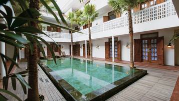 Outdoor pool, sun loungers