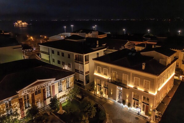 A historic building with a central courtyard, large windows, and a prominent entrance. - 3Sixty Hotel & Suites (Nafplio)