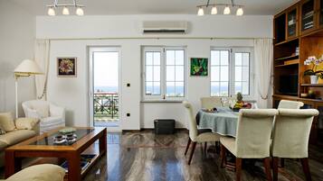 Family Suite, 2 Bedrooms | Living area | LCD TV
