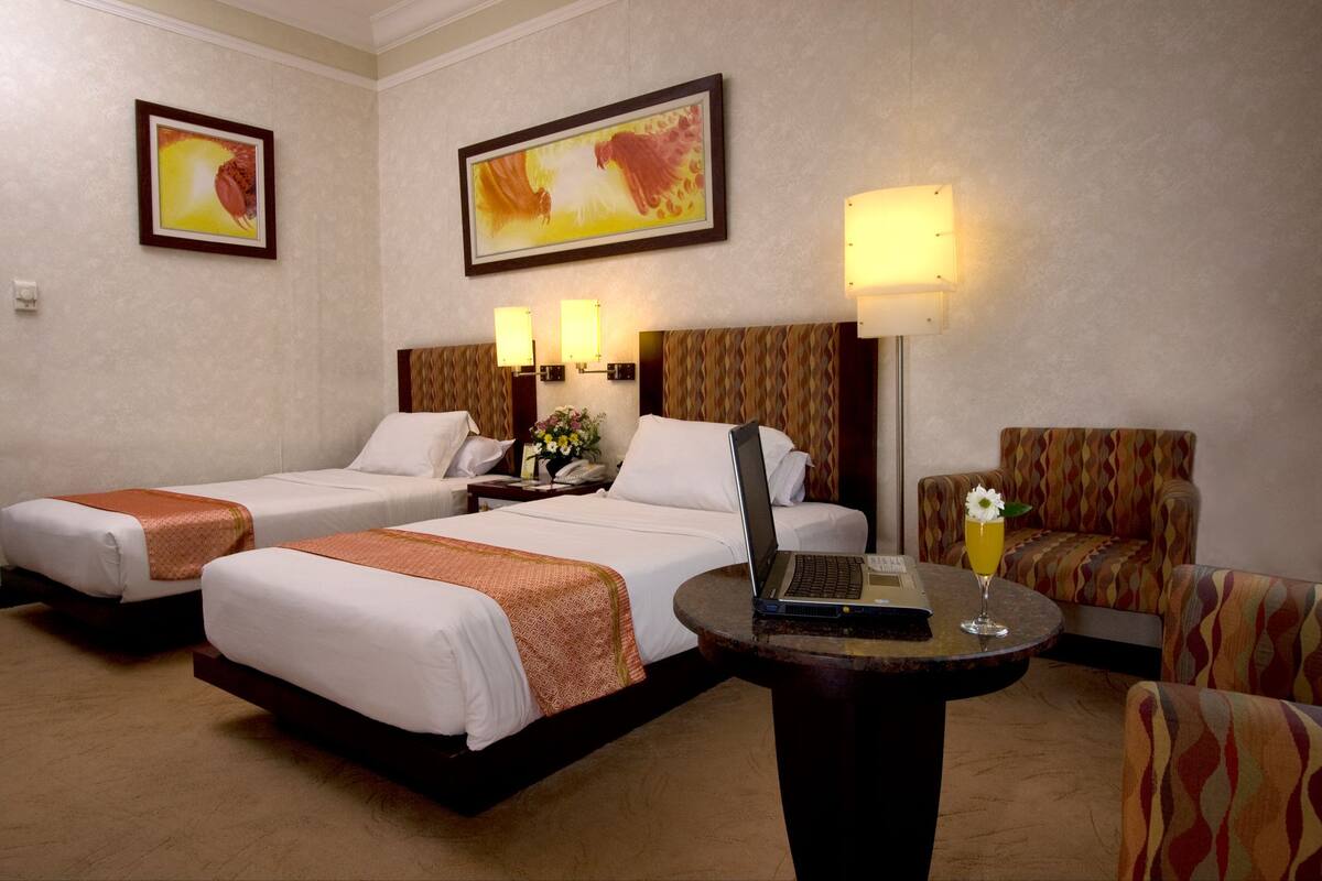 deluxe room | premium bedding, in-room safe, desk, free cots/infant beds