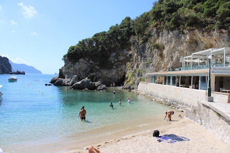 Beach nearby, beach towels. Zefiros Traditional Hotel