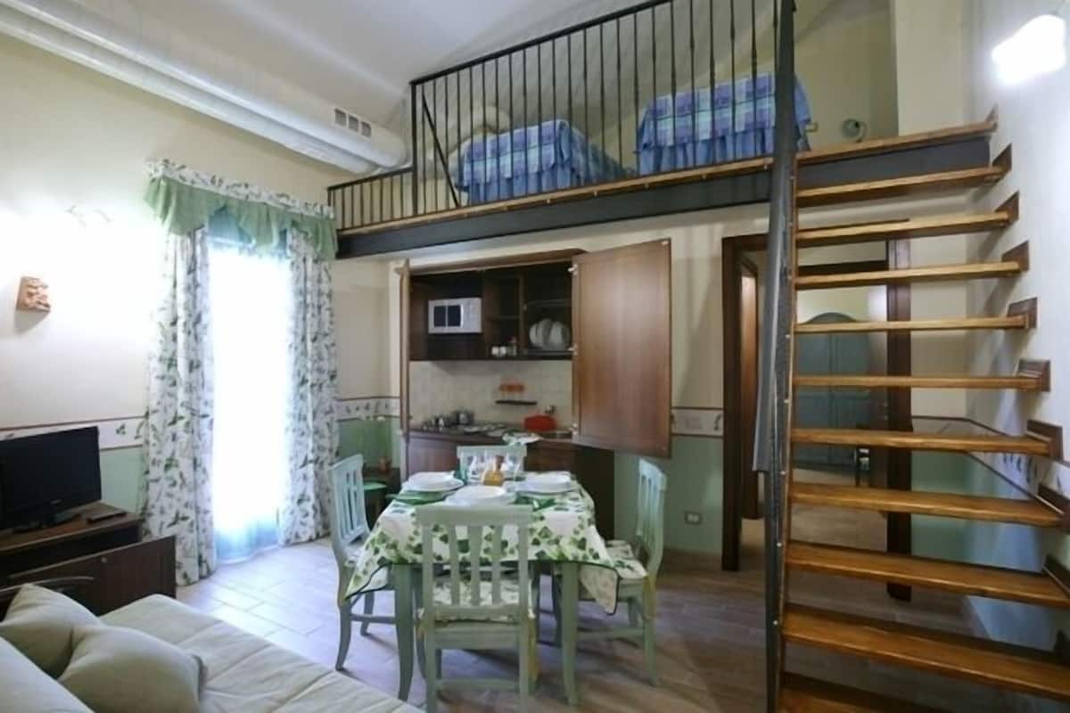 Appartement, 1 chambre | Coin séjour