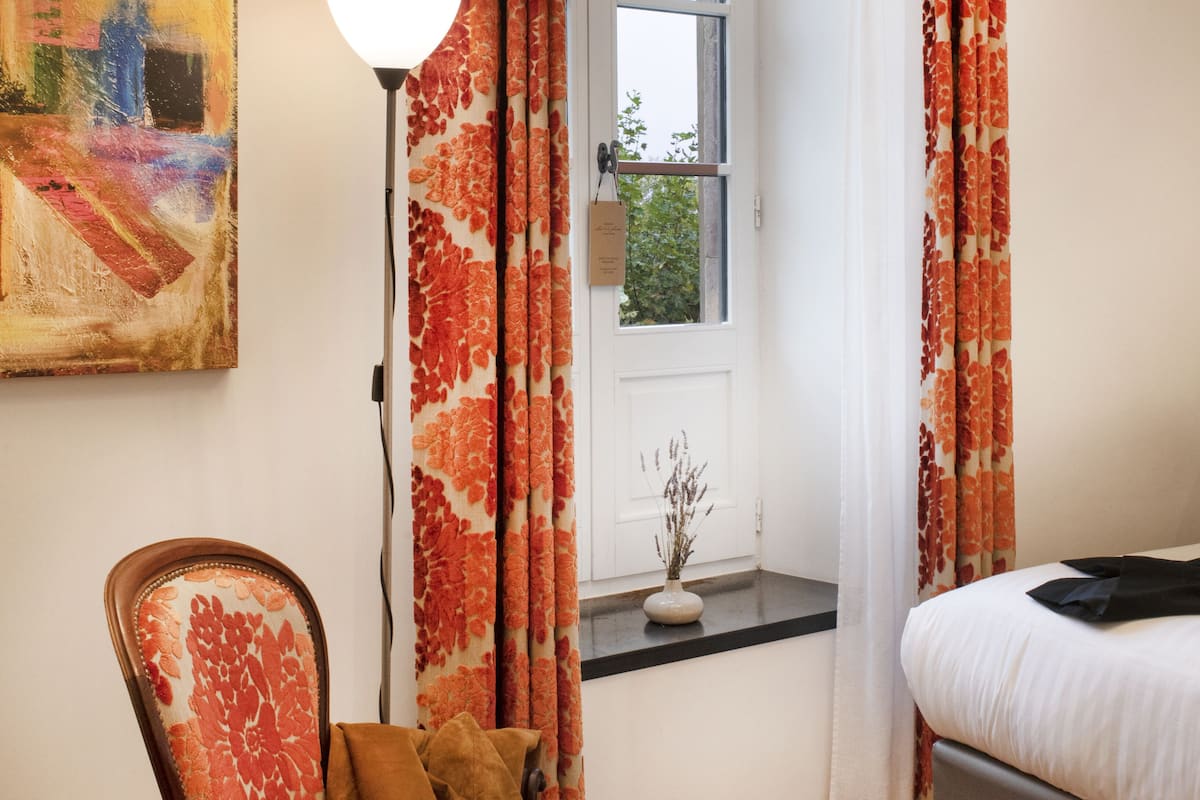 superior double room, garden view | premium bedding, in-room safe, individually decorated, desk
