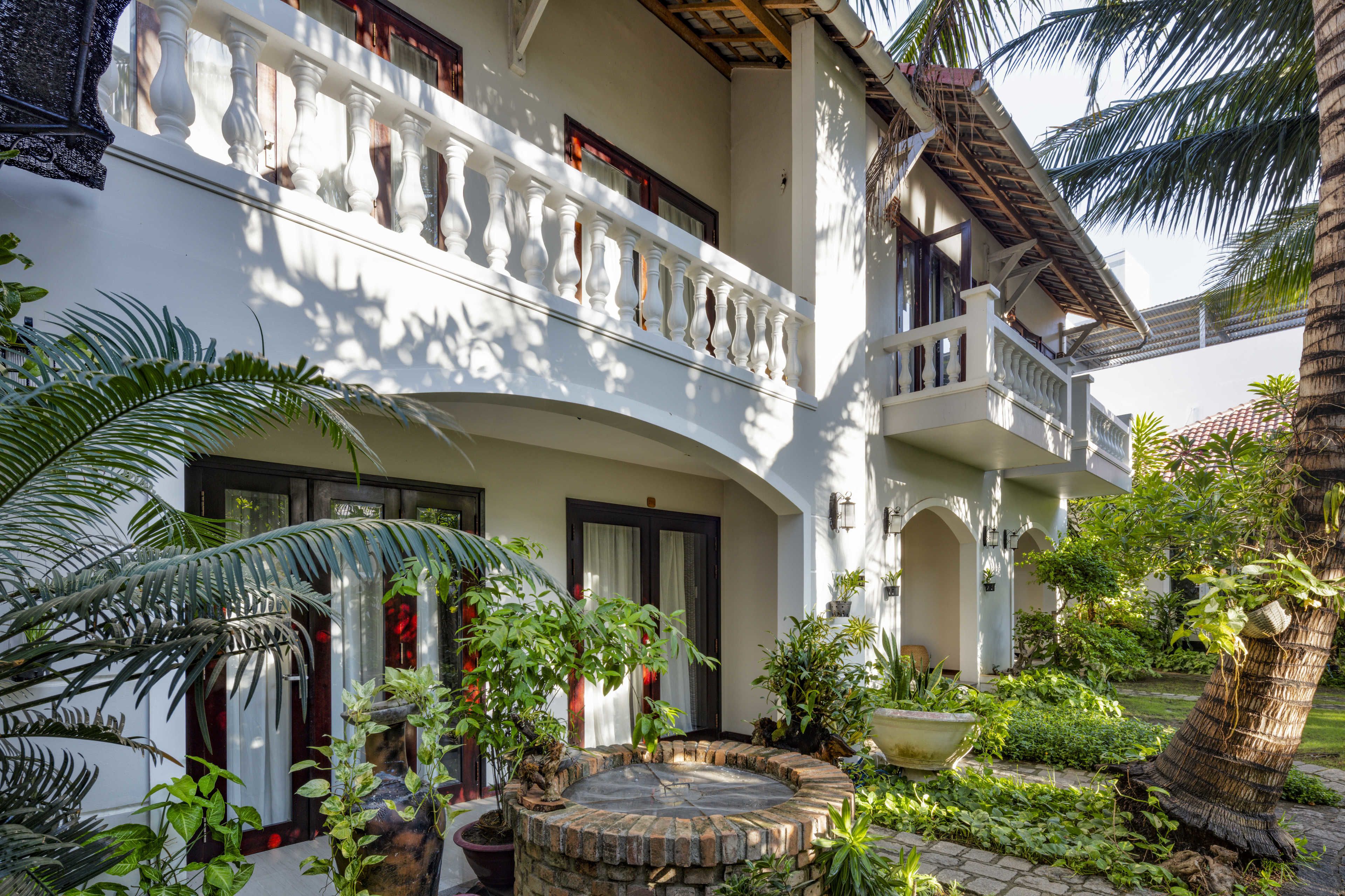 Habitación triple Deluxe (Tropical) | Vistas al patio