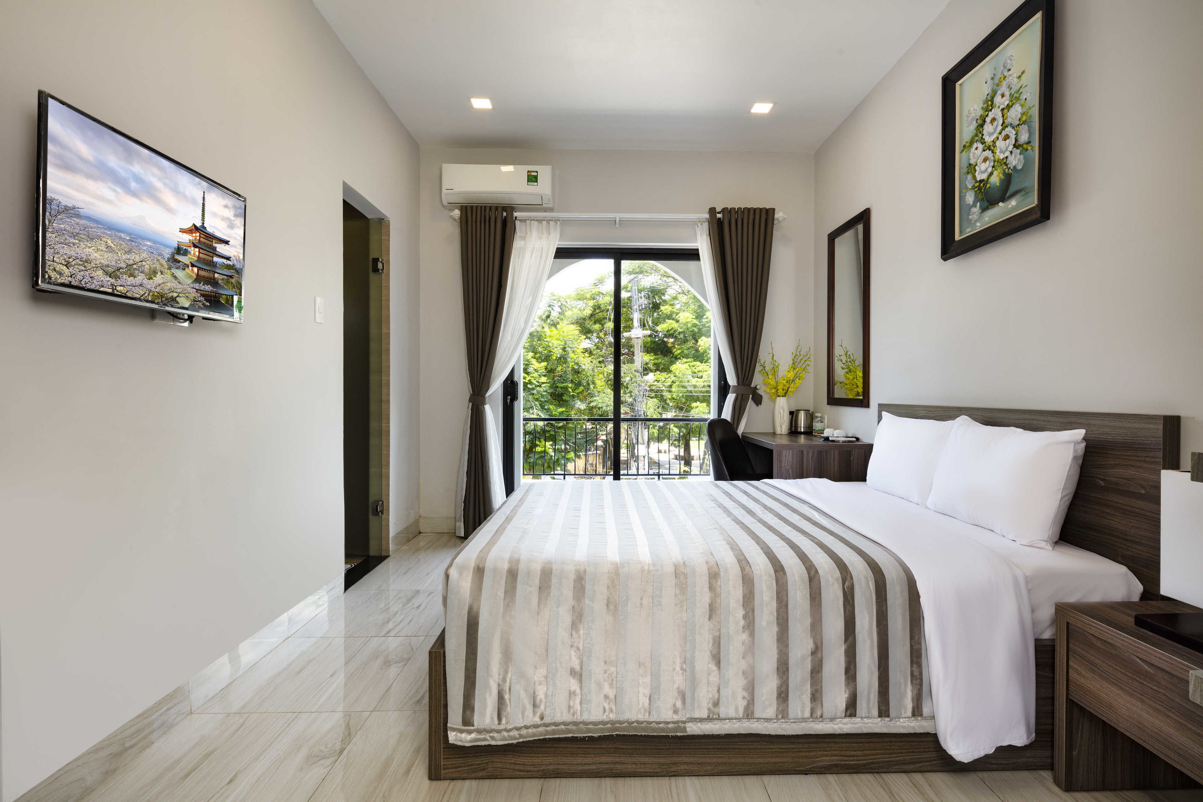 Habitación Deluxe con 1 cama doble o 2 individuales (Tropical) | Minibar, caja fuerte, escritorio y sistema de insonorización